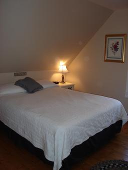 Bedroom with queen bed